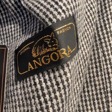 ANGORA 체크 무늬 버튼 스커트