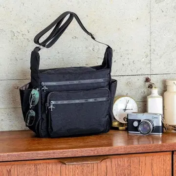 도부 탑 투어가 생각한 여행 가고 싶어지는 기능파 숄더백