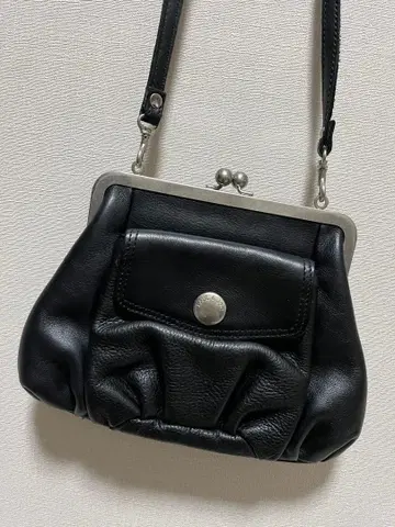 폴 앤 조의 천연 가죽 가마구치 백