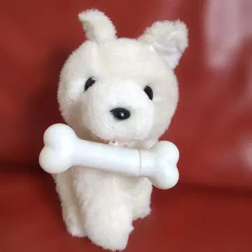 구 산리오 뼈다귀를 문 강아지