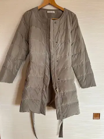 새상품급 노카라 다운 코트 38 사이즈