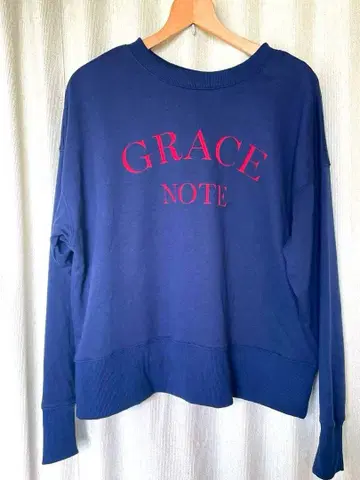 [ un dix cors ] 앞뒤 2WAY 플로키 로고 쭈리 상의 네이비