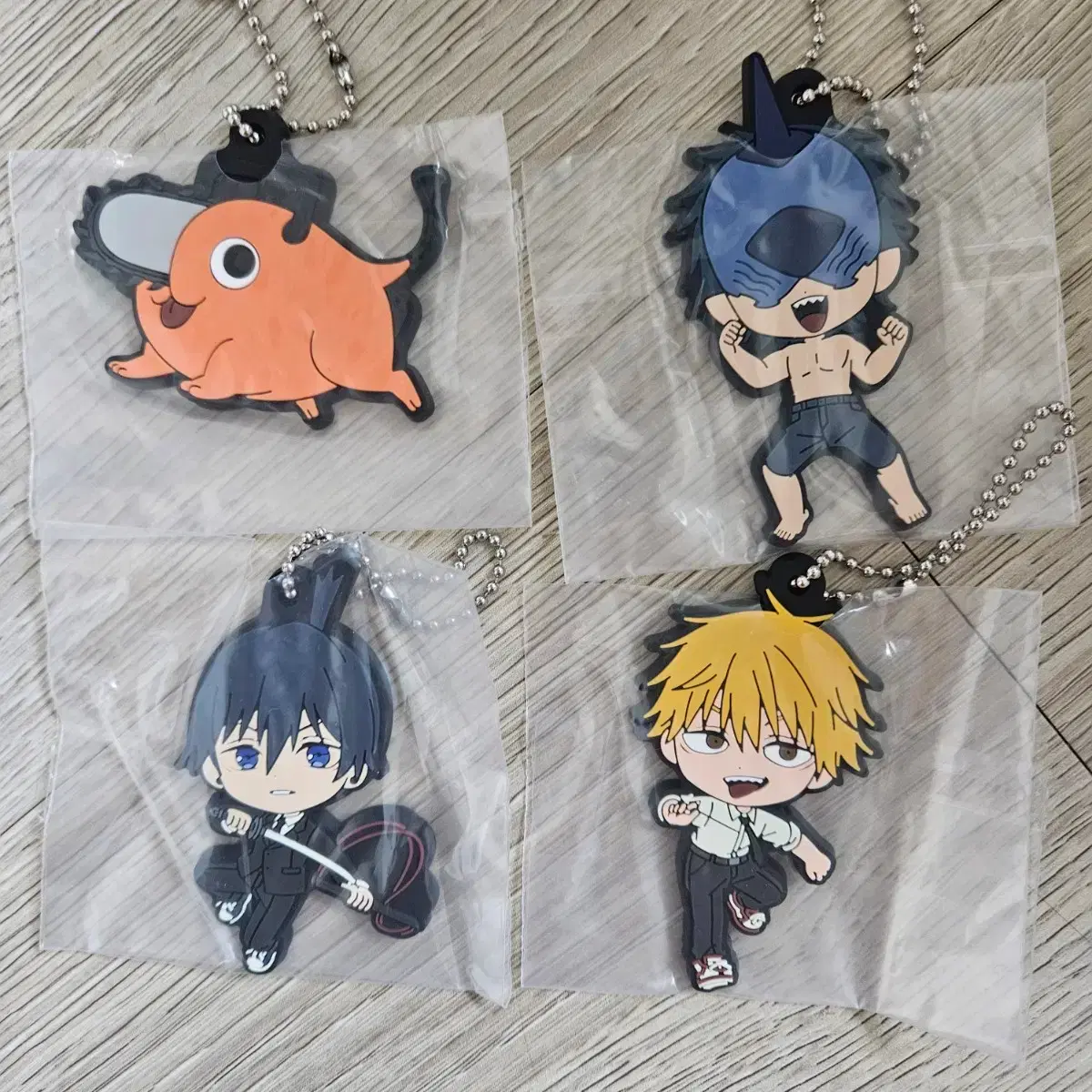 Chainsaw Man Reze Arc Ichiban Kuji Rubber Strap featuring Pochita, Denji, Beam, and Aki