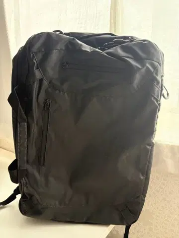 고 슬로우 카라반 블랙 백팩