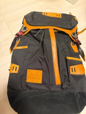 코듀라 소재 블랙/오렌지 백팩