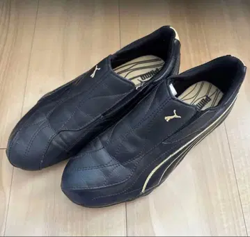 Puma 블랙/골드 스니커즈