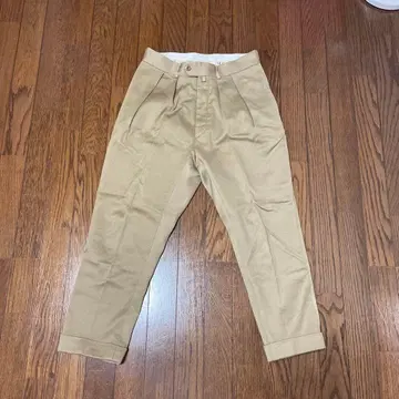 NEAT 베이지 테이퍼드 팬츠