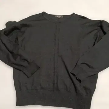 리플렉트 밑단 프릴 니트 L 사이즈