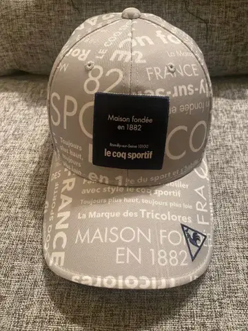 미사용 새상품 le coq sportif 텍스트 프린트 캡