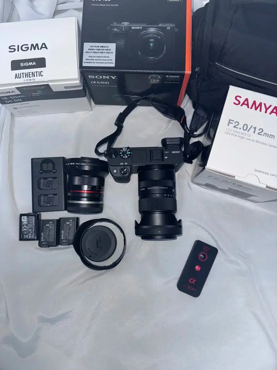 Sony a6400 + Sigma 18-50 + Samyang 12mm