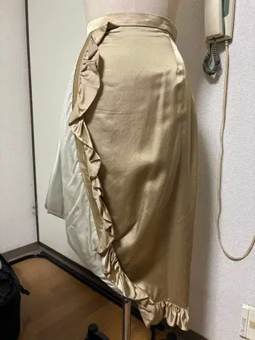 언리얼에이지 프릴 장식 비대칭 미디 스커트