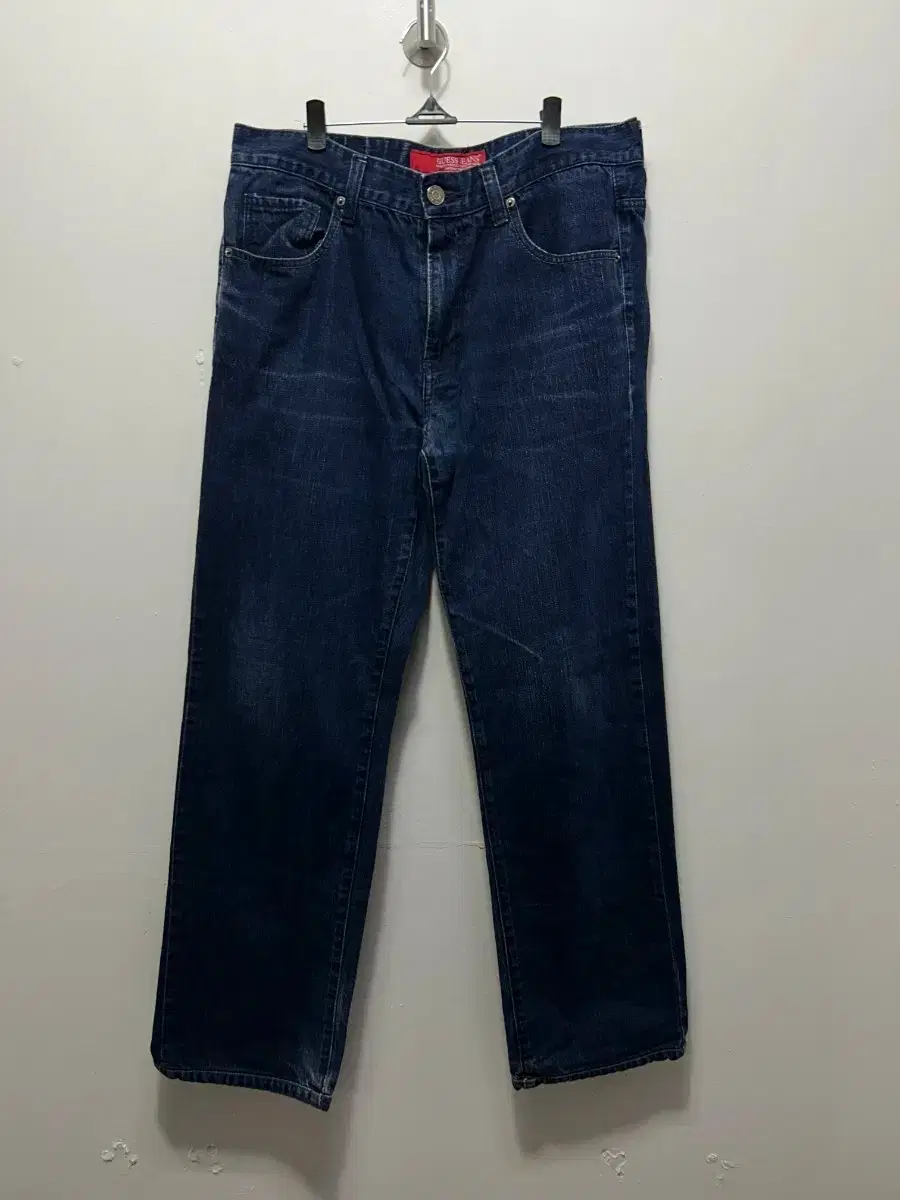 34 Guess dark blue denim jeans
