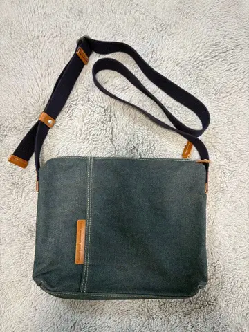 배기 포트 숄더백