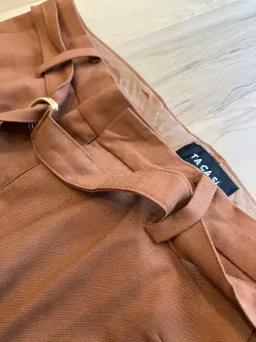 TACASI 브라운 플레어 팬츠