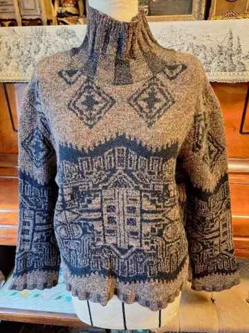 센소유니코 터틀넥 스웨터