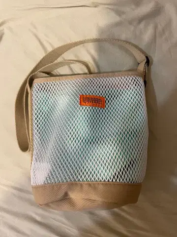 Universa 오버롤 메쉬 숄더백