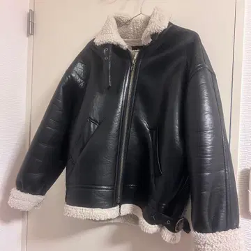 블랙 가죽 무스탕 코트