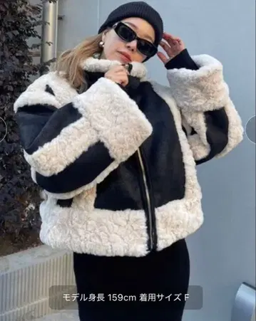 EVRIS 숏 페이크 무스탕 블루종 F