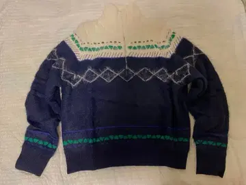 PAMM의 하프 지퍼 스웨터입니다.