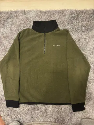 subciety 하프 지퍼 플리스