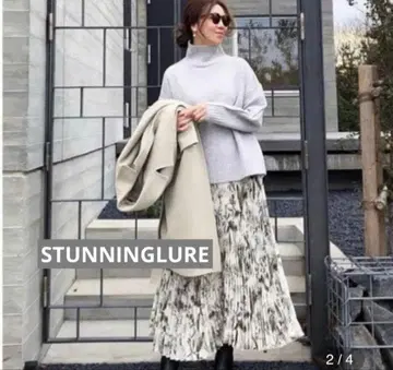 스터닝 루어 플리츠 플레어 스커트