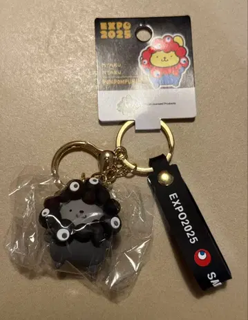 간사이 박람회장 한정판 블랙 미야쿠미야쿠 변신 키링 폼폼푸딩