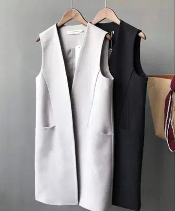 [ 미사용 새상품 ] 베스트 슬리브리스 롱 베스트 그레이