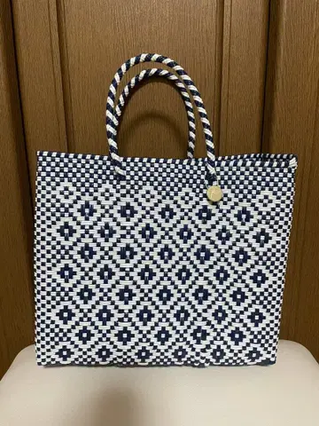 letra 메르카도 백 xs 사이즈