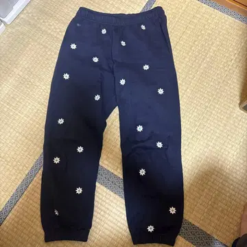 NICKGEAR 꽃 자수 올 패턴 스웨트 팬츠