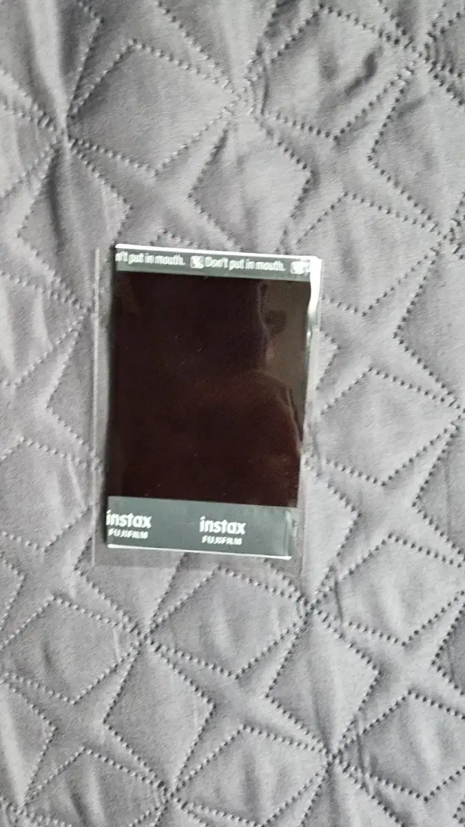 Fifty Fifty Kina sign polaroid