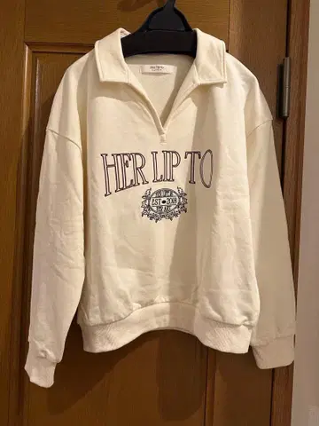 her lip to Embroidery Polo Sweatshirt