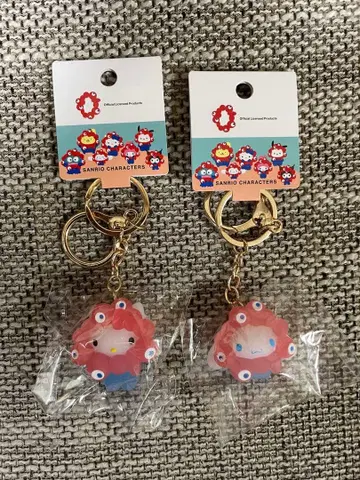 오사카 만박 산리오 먀쿠먀쿠 클리어 키링 키티&시나모롤