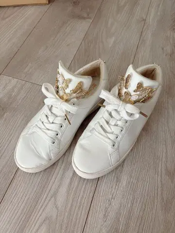 MICHAEL KORS 화이트 나비 장식 스니커즈