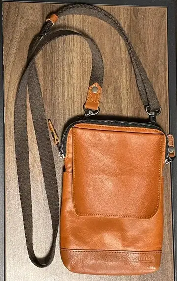 DOUBLES 오렌지 가죽 숄더백