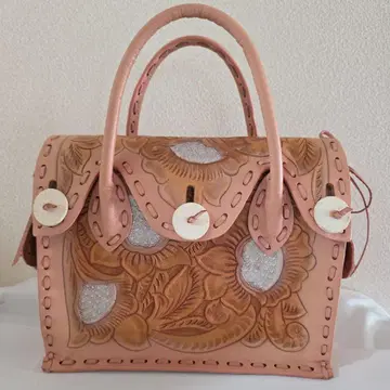 카빙 트라이브스 핸드백