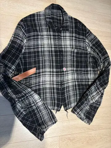 Sunsea shrinkage check blouson