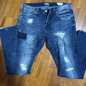 테이퍼드 데미지 가공 스키니 데님