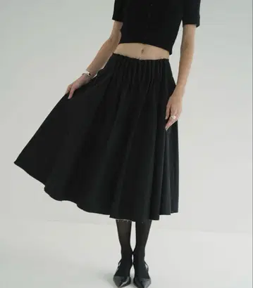 CLANE TUCK DETAIL FLARE SKIRT