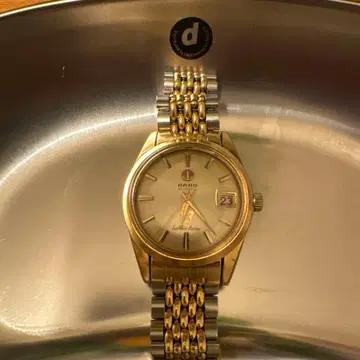 RADO 골드 시계 날짜 표시