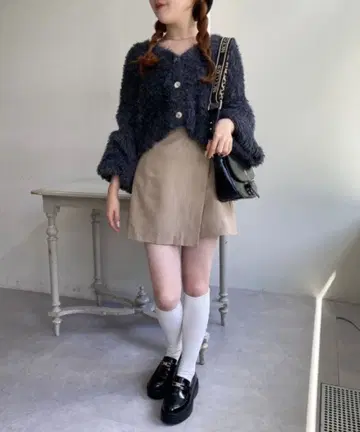 NICE CLAUP 페더 숏 가디건