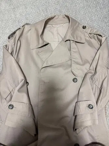 미라 오웬 체크 트렌치코트