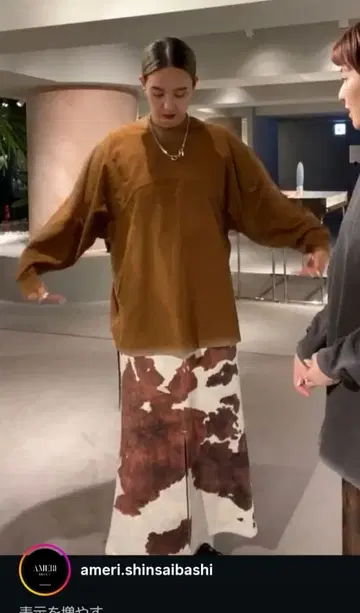 AMERI COW PATTERN SUEDE LIKE SKIRT 브라운