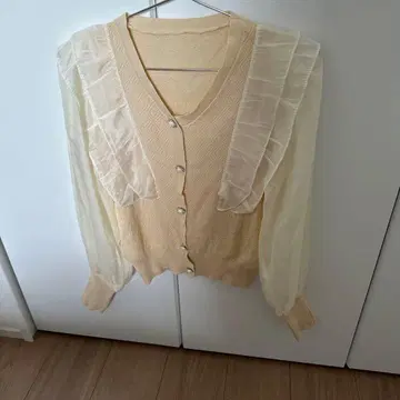 크림색 시스루 소매 프릴 가디건