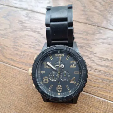 NIXON 크로노그래프 손목시계 블랙/골드