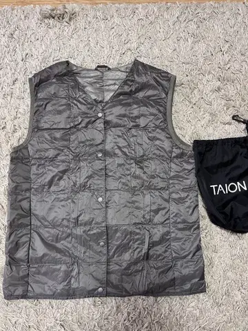 새상품급 TAION 이너 다운 베스트 그레이 타이온 수납 봉투