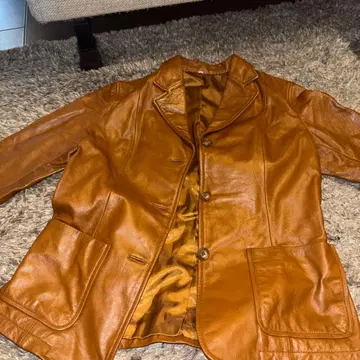 브라운 가죽 버튼 달린 가죽 자켓