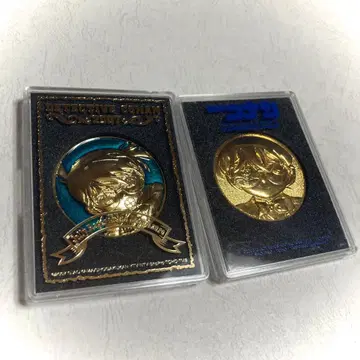 명탐정 코난 극장판 메달: 눈동자 속의 암살자, 푸른 해바다의 묘표