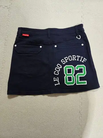 LE COQ SPORTIF 82 자수 네이비 스커트