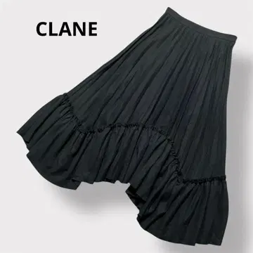 CLANE 프릴 플리츠 볼륨 스커트 티어드 롱 울 블랙