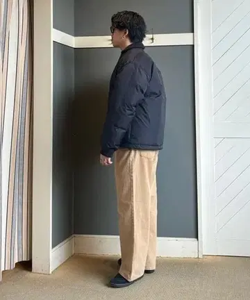 TAION 블랙 다운 자켓